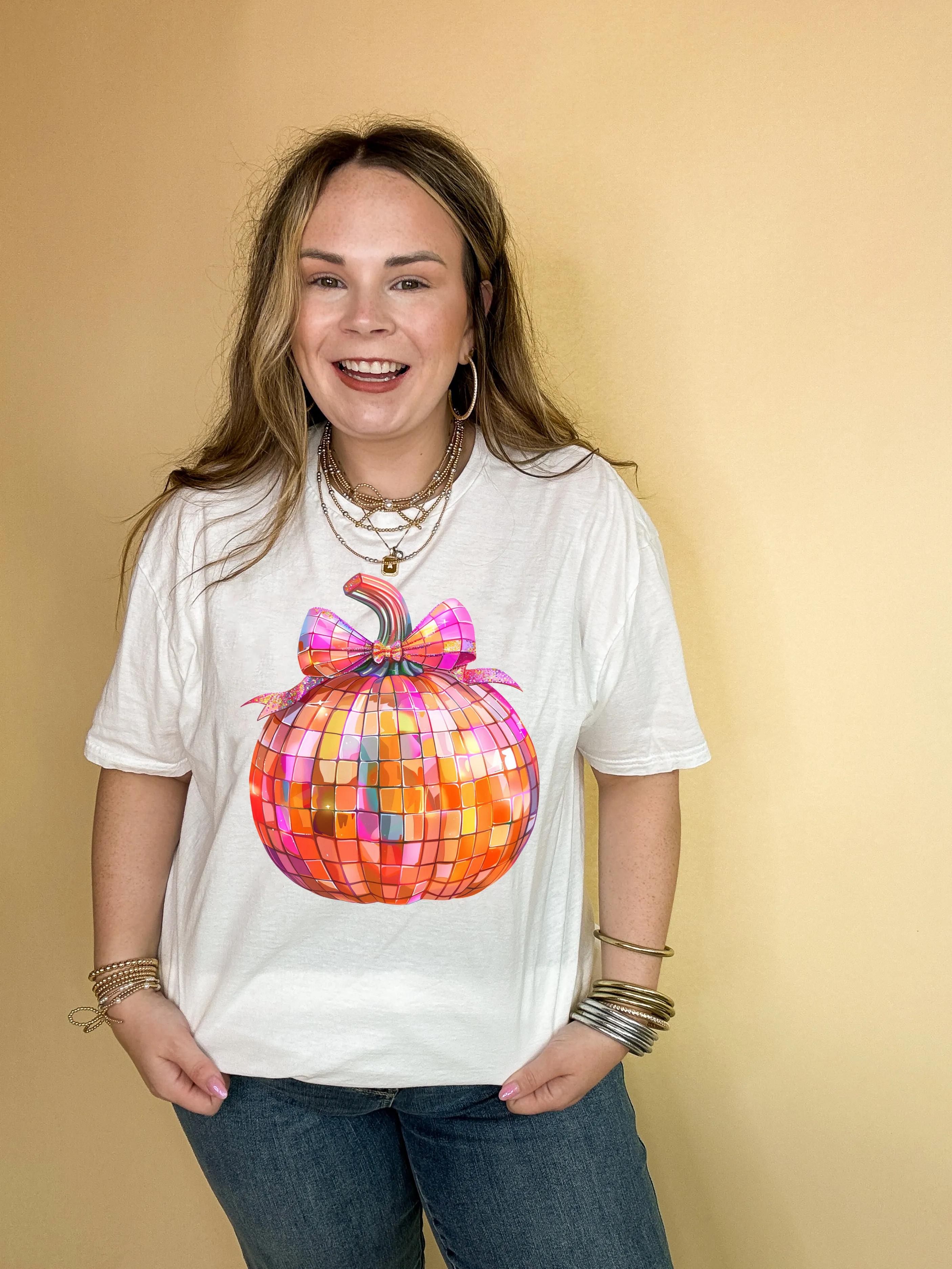 Online Exclusive | Disco Multi Colored Pumpkin with Bow Graphic Tee in Multiple Color Options